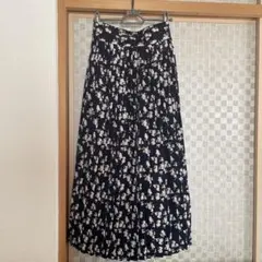 adapt retailing 紺地花柄プリーツスカート