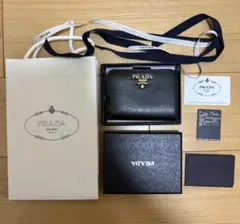 新品未使用】PRADA PORTAF VERTI PICCOLO 二つ折り財布 - メルカリ