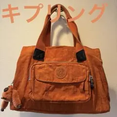 キプリング　チャーム付ハンドバッグ　オレンジ