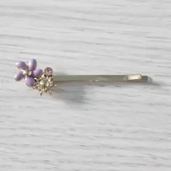 新品未使用ディズニープリンセス塔の上のラプンツェルヘアピンおしゃれお花紫ゴールド