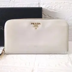 PRADA サフィアーノレザー　ラウンドファスナー リボン付き長財布 ホワイト PRADA 長財布 サフィアーノ リボン ラウンドファスナー - メルカリ