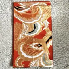 名古屋帯　オレンジ 金と黒の刺繍