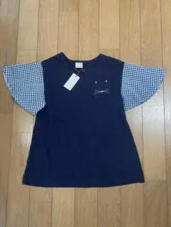 タグ付き、新品。プティマイン☆ネコポケットチェックフレアスリブトップス。