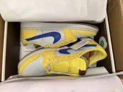 Travis Scott × Women's Air Jordan 1 Low