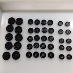 紳士用黒い4つ穴ボタンセット
