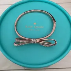 ケイトスペード　ピンクゴールドのリボンブレスレット