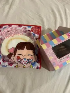 ペコちゃん　ミルキークリームロールクッション　傘 ペコちゃん ミルキークリームロールクッション 傘 - メルカリ