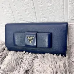 良品 PRADA フィオッコ サフィアーノ 長財布 ネイビー リボン - メルカリ