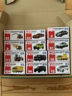 トミカ 12台セット まとめ売り 未開封 一つ凹みあり - メルカリ
