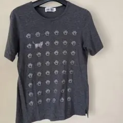 クニオコレクションのグレー紀子 キラキラ足跡スパンコールの tーシャツ