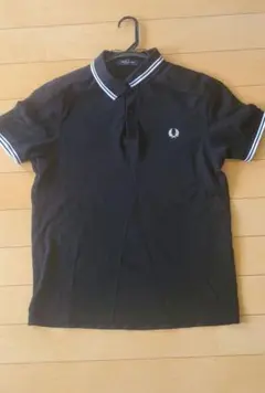 SAINT LAURENT ブラック ポロシャツ M Cassandre Polo Shirt in Piqué in Black | Saint Laurent | YSL EN-US