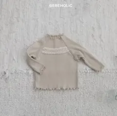 BEBEHOLIC フリル付きリブ編みトップス ベージュ 70