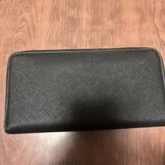 小田和正 ファーイーストカフェブラックレザー長財布 - メルカリ