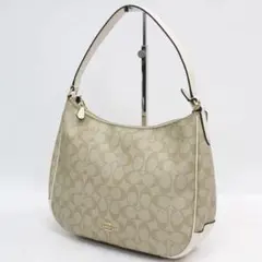 Coach ベージュ ロゴパターン ショルダーバッグ