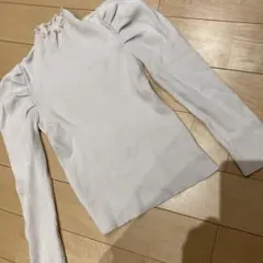 リブ編みホワイトトップス フリルネック　グレイル　S