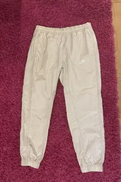 NIKE ナイキ ウーブン ボンバー パンツ　ベージュ L