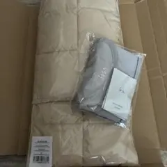 新品SUKALA マフラー オフホワイト ＆化粧品メーカーイプサポーチ非売品