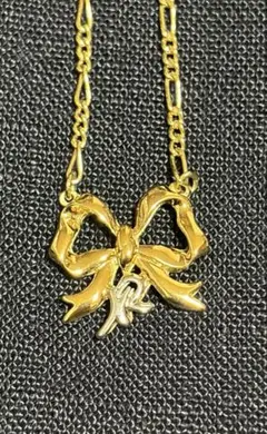 Nina Ricci リボンモチーフ ネックレス ゴールド ストーン付 - メルカリ