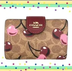 COACHコーチ（さくらんぼ柄）シグネチャー チェリープリント 二つ折り財布