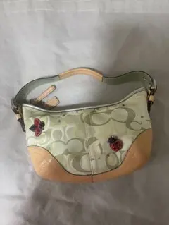 美品　COACH コーチてんとう虫 シグネチャー ビジュー バンドバッグ