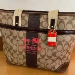 COACH コーチ シグネチャー トートバッグ ブラウン 馬車 レッドロゴのサムネイル