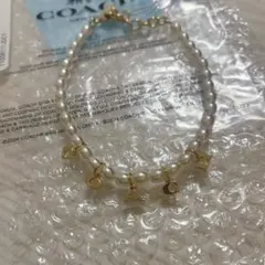 コーチ　アウトレット　パール　チャーム　ブレスレット