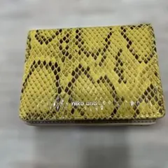 niko.andイエローヘビ柄二つ折り財布
