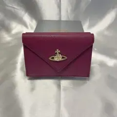 新品 VivienneWestwood エナメル表面 赤 レッド 専用内装 三つ - メルカリ