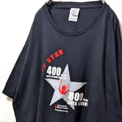 デルタ コミュニティスター ブラッドドナー ロゴ Tシャツブラック黒XL古着のサムネイル