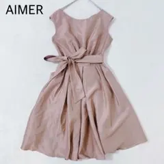 AIMER エメ パーティードレス ひざ丈　ピンクベージュ 光沢　ウエストリボン