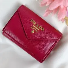 プラダ　サフィアーノレザー　本革　折り財布　1MH021 ゴールドロゴ　パープル