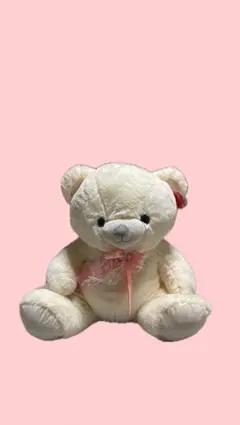 クリーム色のクマのぬいぐるみ