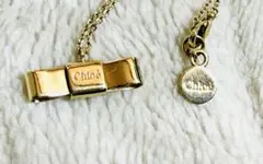 Chloe クロエ リボン型 ネックレス ロゴチャーム ゴールドのサムネイル