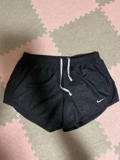 Nike ブラック M ランニングパンツ　レディース