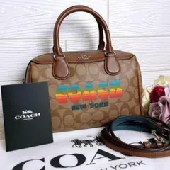 新品】COACH × PEANUTS チャーリーブラウン ショルダーバッグ - メルカリ