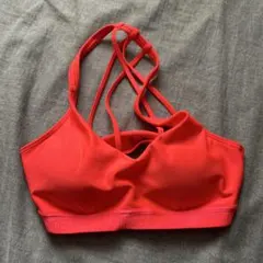 Under Armour スポーツブラ MD 蛍光オレンジ