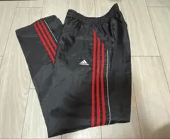 adidas 黒ブラック 赤サイドライン トラックパンツ ワイドパンツ ナイロン