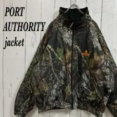 [452]PORT AUTHORITYカモリアルツリーウォームアップジャケット