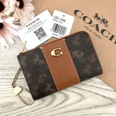 COACH直営店コーチシグネチャー 刺繡フローラルスムース ミディアム二