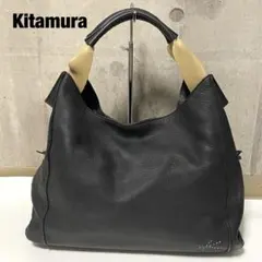 美品 キタムラ ショルダーバッグ ステッチロゴ A4収納 巾着 本革 シボ革 黒
