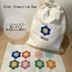 名入れ刺繍巾着　ハンドメイド　ニコちゃん　プチギフト　名入れ