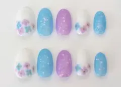 ハンドメイド　ネイルチップ　オーバル　水色　紫色　ピンク　お花デザインのサムネイル