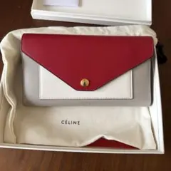 CELINE エンベロープ型二つ折り財布 赤とベージュ CELINE エンベロープ型二つ折り財布 赤とベージュ - メルカリ