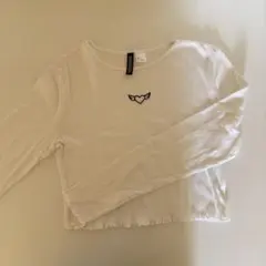 ハートと翼刺繍のホワイト長袖トップス