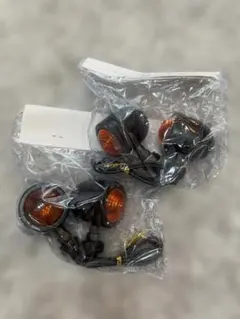 新品 砲弾ウインカー 4個セット ブラック アンバー 汎用 ドラッグスターのサムネイル