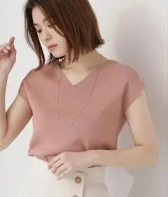ナチュラルビューティベーシック 総針フレンチスリーブニット　Vネック　コーラル