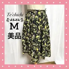 テチチ　Mサイズ　美品　フェミニン フレアスカート 黒地 花柄 ひざ丈