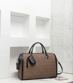 新品未使用】nunelaトラベルボストンバッグ - メルカリ