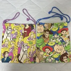ディズニーリゾート限定 巾着 2枚セット トイストーリー ラプンツェル 総柄