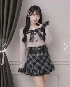 piumチェックレイヤードリボンニットトップス レザーベルト付きプリーツスカート